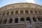 Glimpse of the Colosseum in Day light, in Rome