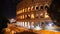 Glimpse of the Colosseum at night, in Rome