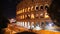 Glimpse of the Colosseum at night, in Rome