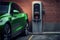 Glimpse into the future of transportation, this photo captures a sleek green electric car charging at a state-of-the