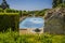A glimpse of ornamental pools and wooded gardens in Cordoba, Spain