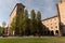 A glimpse of the Palazzo della Pilotta, Parma, Italy, framed in an arch