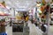 A glimpse of a religious shop in a mall, indian God idols, buddha and flowers