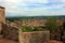 Glimpses of the romantic Tuscan town of San Gimignano in stones on the ancient hill