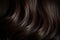 Glistening elegance Texture of shiny, rich brunette hair exudes luxurious allure