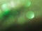 Glitter clear pattern on dark green defocus background. Holiday boke