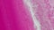 Glitter fluid spill paint drip pink white ink wave