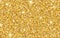 Glitter gold texture. Golden background with shining sparkles. Luxury template for advertising. Glamour backdrop for