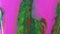 Glitter ink drip paint spill neon pink green mix