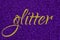 Glitter lettering word gold on ultra violet sparkle texture. Shiny background