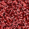 Glitter seamless texture. Adorable red particles. Endless pattern made of sparkling squares. Emotion