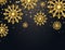 Glitter snowflakes with falling particles on dark background. Shining gold snowflakes with star dust. Sparkling