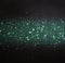 Glitter vintage lights background. light silver, green and black. defocused.