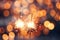 Glittering burning sparklers against blurred colorful bokeh background. Celebrating Christmas and New Year\\\'s Eve