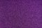 Glittering lilac paper sheet. Violet texture background. Sparkling purple pattern