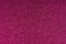 Glittering magenta paper sheet texture background. Sparkling golden red wine color pattern