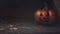 Glittering spooky Halloween pumpkin on home porch. House decoration