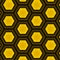 Glittery golden hexagons in a repeating pattern