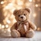 glittery smiling teddy bear wearing a bow tie on golden bokeh background