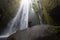 Gljufrafoss waterfall with active woman