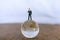 Global and Business Concept. Businessman miniature people figure standing on glass clear world ball model