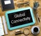 Global Connectivity - Text on Small Chalkboard. 3D.