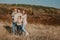 Global Day of Parents. Happy family enjoying together on a sunny day in country. father, mother and two boy children having fun