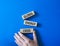 Global Energy Crisis symbol. Wooden blocks with words Global Energy Crisis. Beautiful blue background. Businessman hand. Business