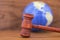 Global equity and justice in wooden gavel still life
