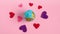 Global Valentines Day Concept - Spinning Earth with Hearts, isolated on beige pastel background. Love the Earth Planet