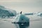 Global Warming Concept with Penguin on a Stranded Melting Iceberg emphasizing the danger of Global Warming