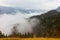 Global warming. mountain landscape. Clouds and fog