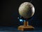 Globe of the planet Earth on a dark blue background with lights. Geography, cartography, environmental conservation. There are no