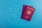 Globe and Russian passport, close-up