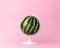 Globe sphere orb watermelon concept on pastel pink background. m