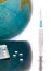 Globe and syringe, pills, medical glove. Medicine, healthcare and medicine, vaccination