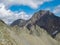 Gloedis - Unique rock formations with panoramic view of the majestic mountain ridges of High Tauern seen near Gloedis