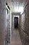 Gloomy corridor with the door underground