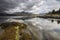 Gloomy day at the lake surrounded by hills and mountains in Mull, Inner Hebrides, Scotland, UK