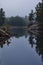 A Gloomy Scene On A Calm Lake In Early Morning