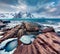 Gloomy spring view of Lofoten Islands. Melting snow on Flakstadpollen fjord