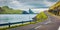 Gloomy summer scene of Faroe Islands and Tindholmur cliffs on background. Panoramic morning view of Vagar island, Kingdom of Denma