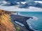 Gloomy summer seascape of Atlantic ocean with popular tourist destination - Hvitserkur, huge basalt stack.