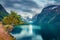 Gloomy summer view of Lovatnet lake, municipality of Stryn, Sogn og Fjordane county, Norway. Dramatic morning scene of Norway. Bea