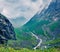 Gloomy summer view of Trollstigen mountain road. Impressive morning scene of Norvegian countryside in June. Traveling concept