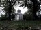 Gloomy view of the Sainte-Beatrix chapel in the forest