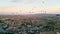 glorious aerial shot of the early morning in Cappadocia, sky full of colorful air balloons