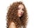 Glorious healthy model with natural make-up, shiny clear skin and long curly hairstyle. Haircare, Skincare, Cosmetology and