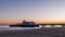 Glorious sunset over the beautiful pier and the sandy beach of Bournemouth, England