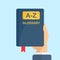 Glossary book in hand icon in flat style. Guidebook encyclopedia vector illustration on isolated background. A-Z notebook sign